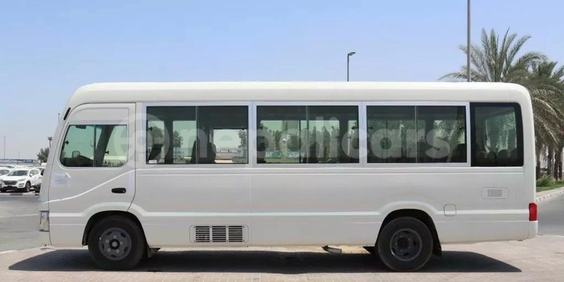 Big with watermark toyota coaster narayani bharatpur 5491