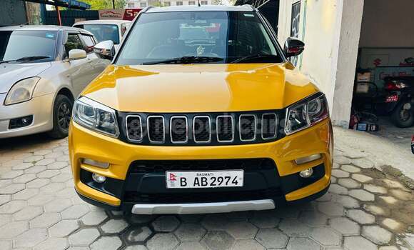Buy Used Suzuki Brezza Luxe yellow Car in Kathmandu metro 13 - kalimati area in Bagmati province